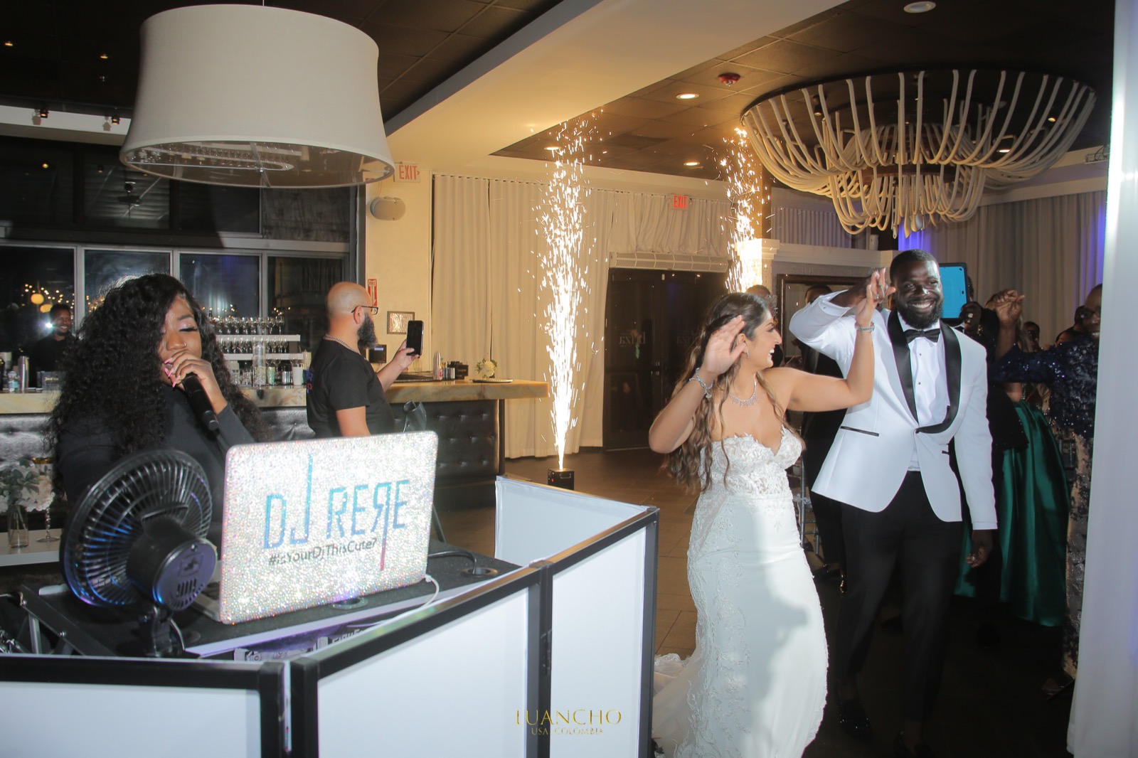 A grand entrance lit by cold sparks at a Miami wedding by REmixed Events