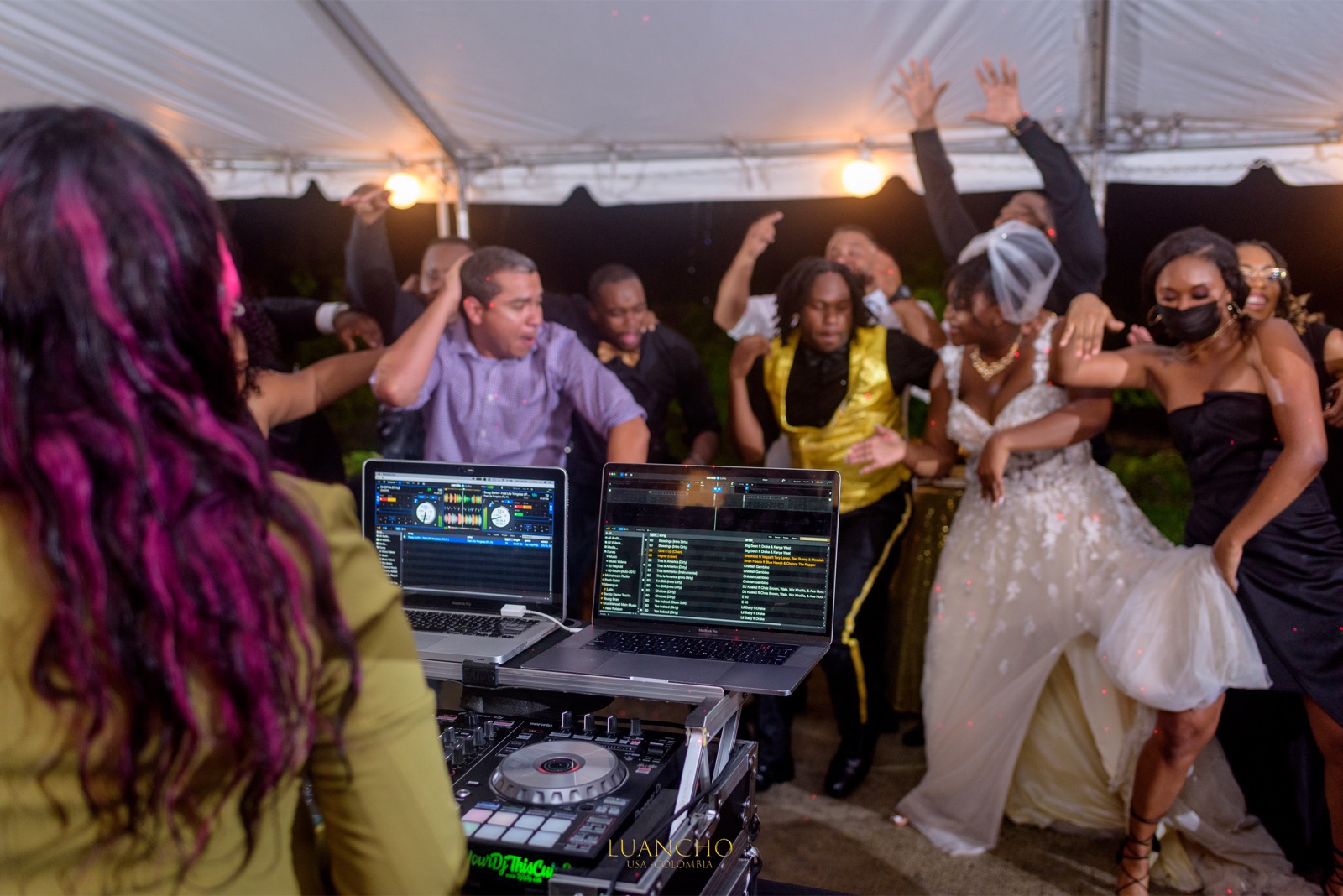 Wedding guests swag surfing on the dance floor